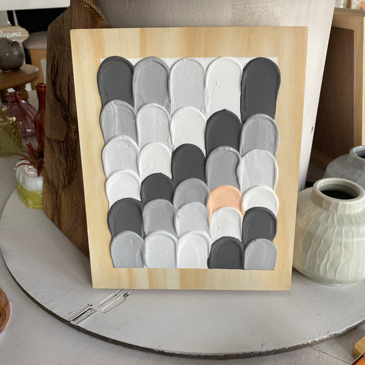 Handmade grey and orange plaster picture