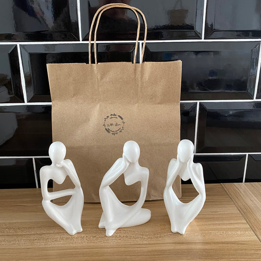 Set of 3 people statues