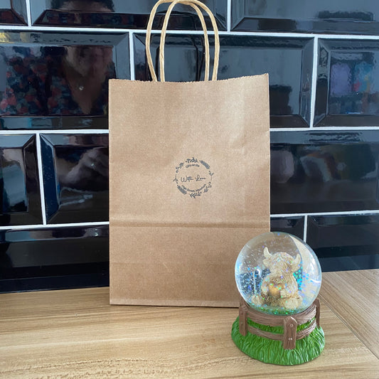 Highland cow glitter globe