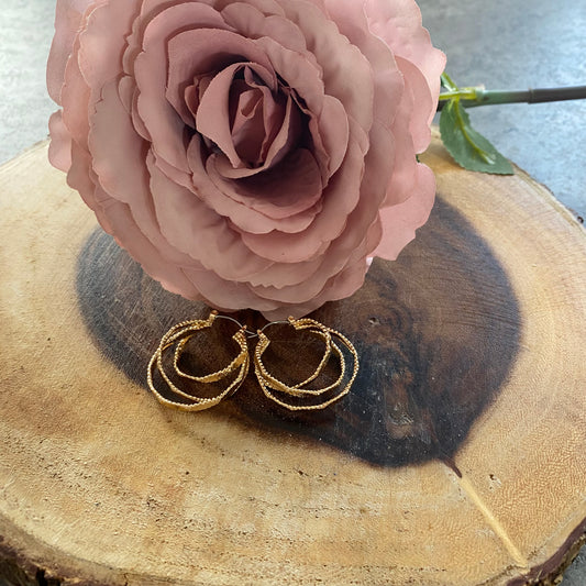 Gold coloured triple hoop earrings