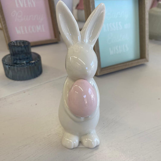 White rabbit with pink eggs